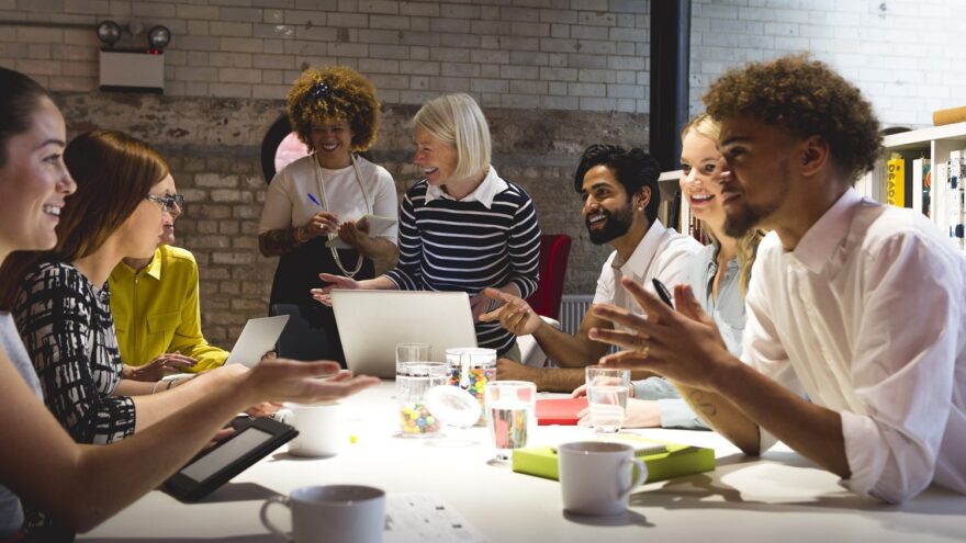 A diverse work team having a meeting.