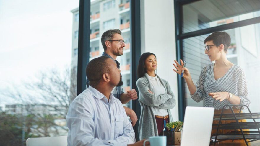 Photo of a group of colleagues having a discussion