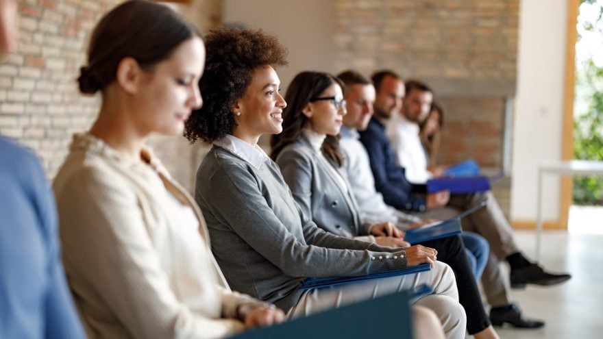 Group of candidate waiting for a job interview in the office.