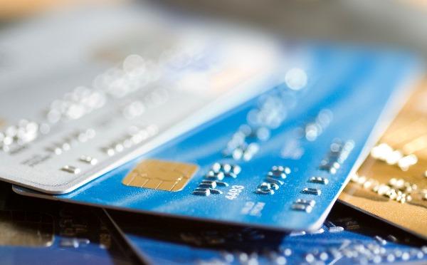 A close up of a stack of credit cards.