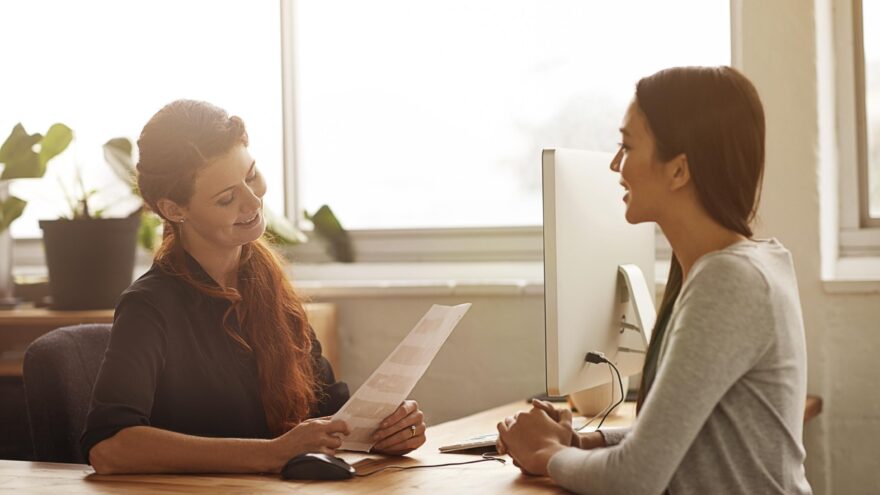 Two women talk about cvs