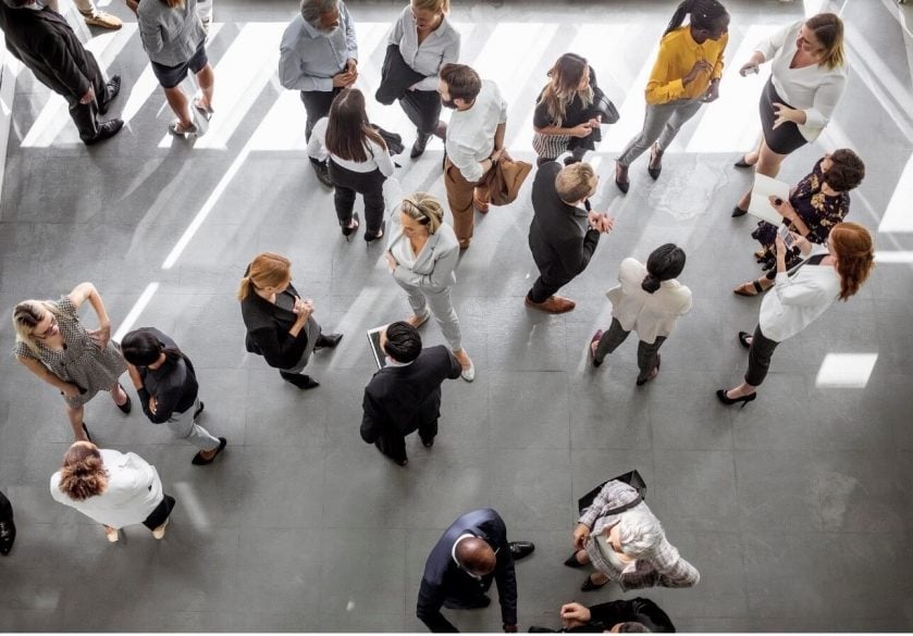 A photo of employees at work, taken from a birds eye view