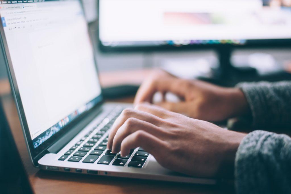 Hands on laptop