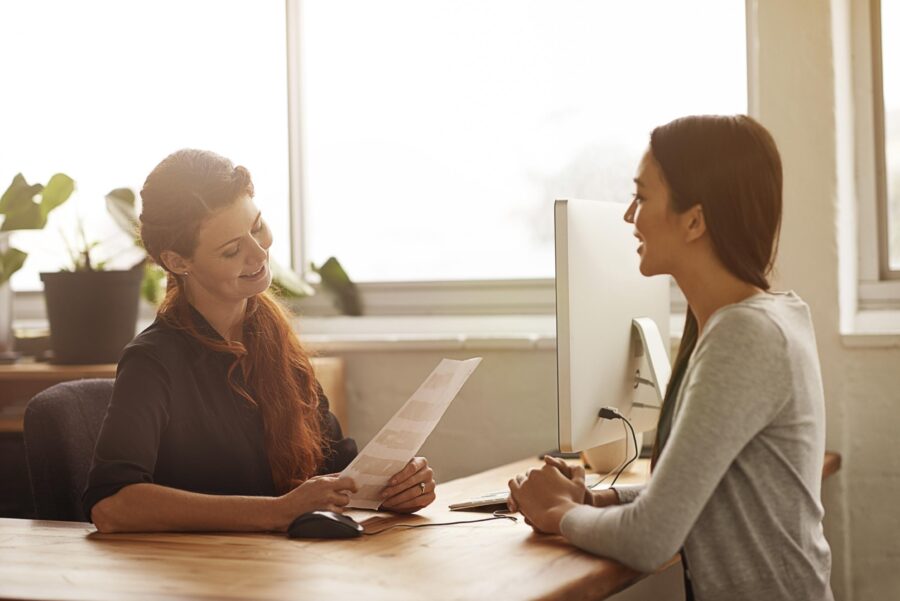 Two women pictured in an interview