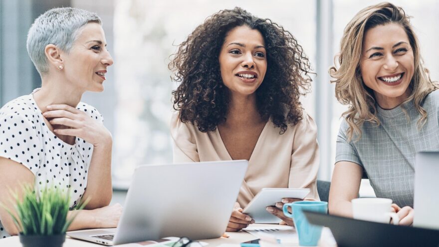 Group of business women talking in an office