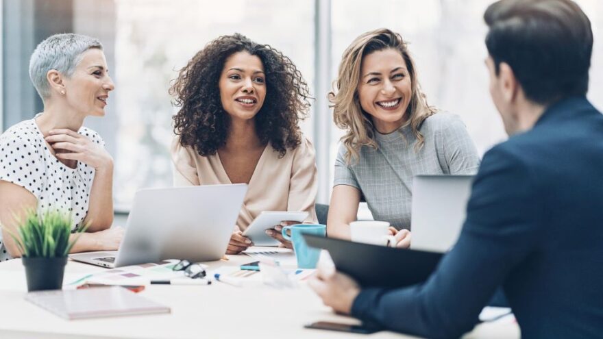 A group of HR employees conducting a panel interview