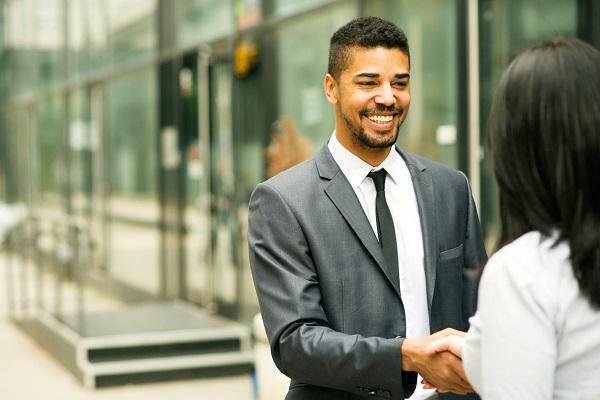 Two business people having a handshake