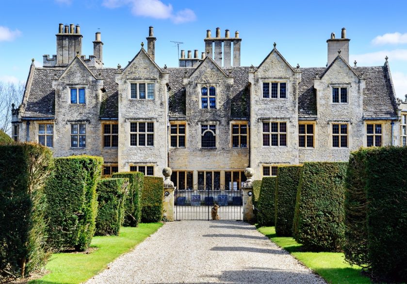 The exterior of a large, old mansion