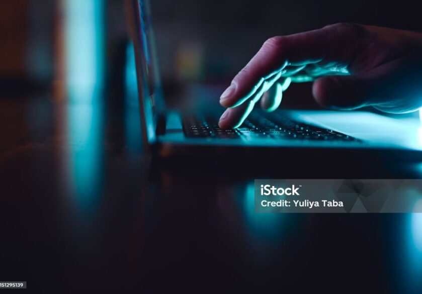 digital recruitment agency London fingers on keyboard in dark room