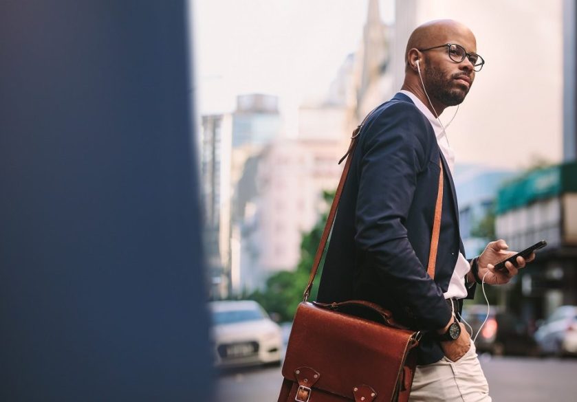A businessman walking on a city street