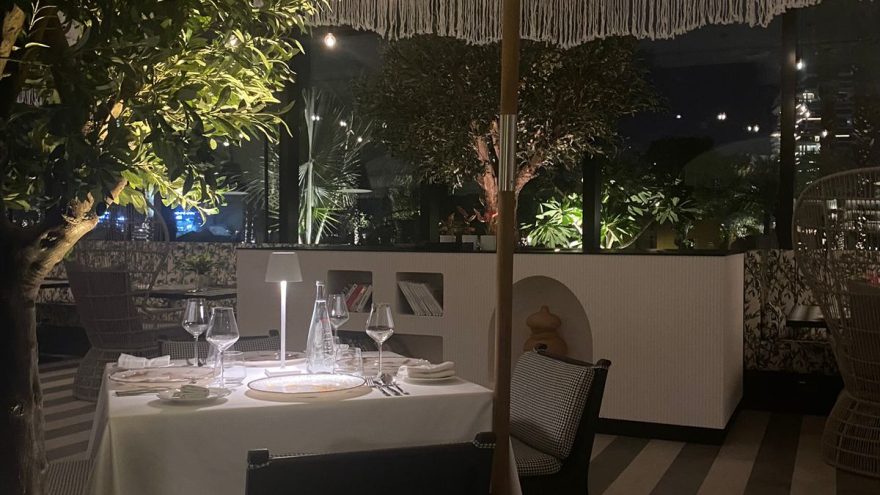 An outdoor patio dining area setting at a Dubai based restaurant.