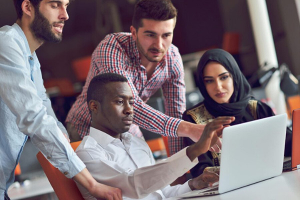 Group of people collaborating around 