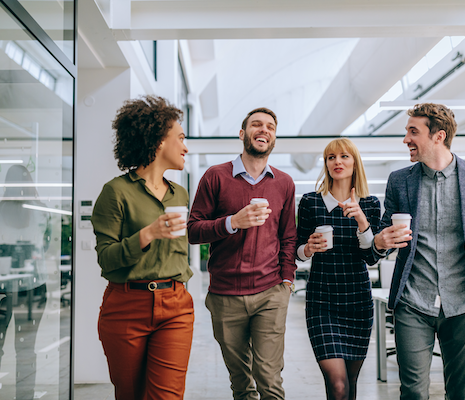 Workers chatting in an office