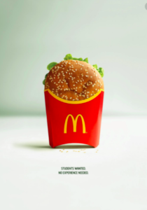  A photo of a McDonald's advert, showing a burger inside fries packaging.